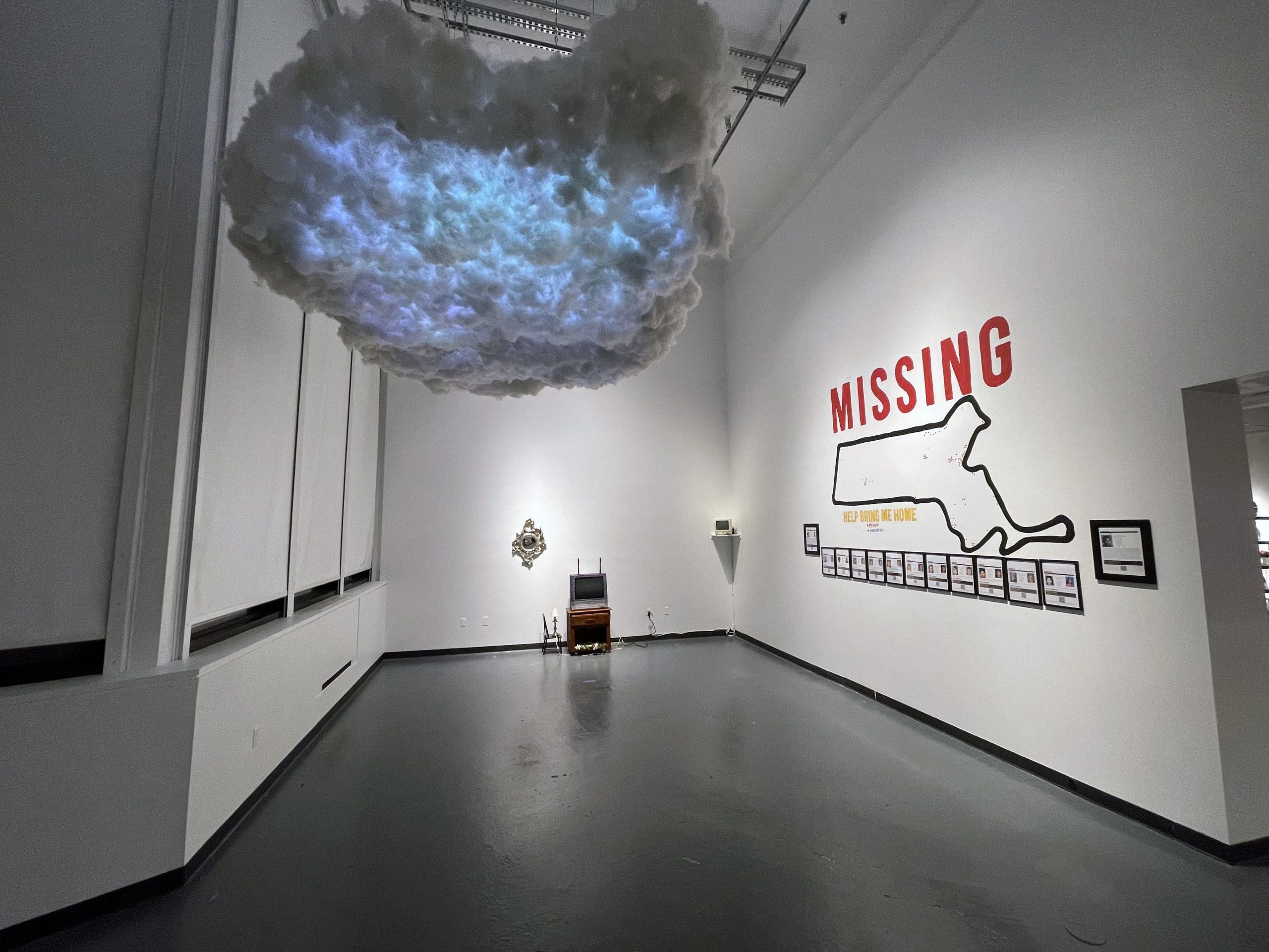 gallery installation view with large cloud